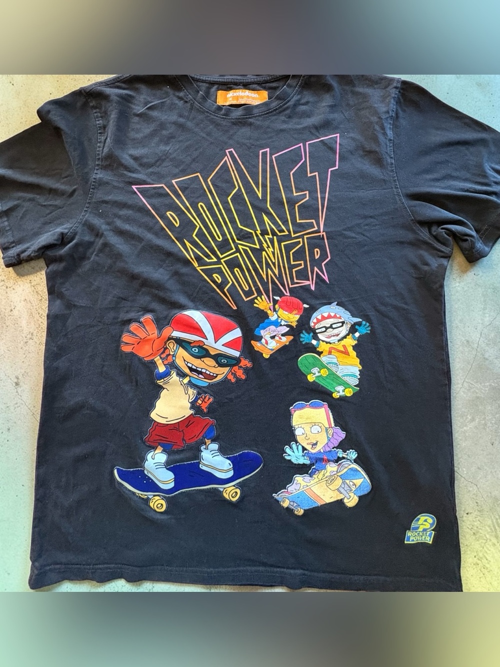 Nickelodeon Rocket Power Black Tee with Yellow and Pink Logo. Men’s XL